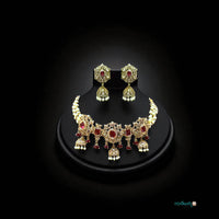 Jewelry set with necklace and earrings on a black background