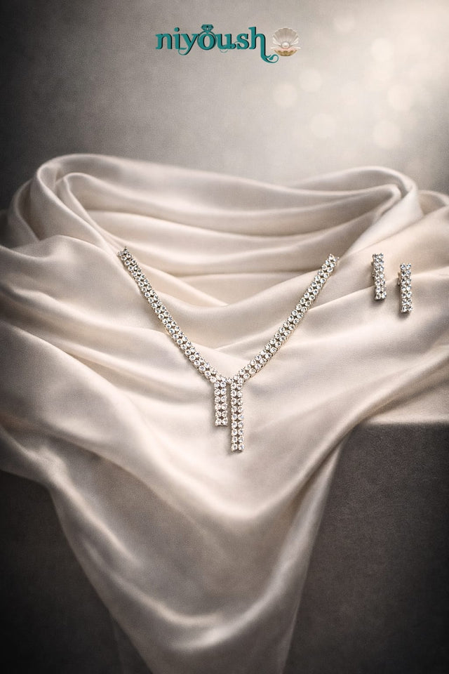 Silver necklace and earrings